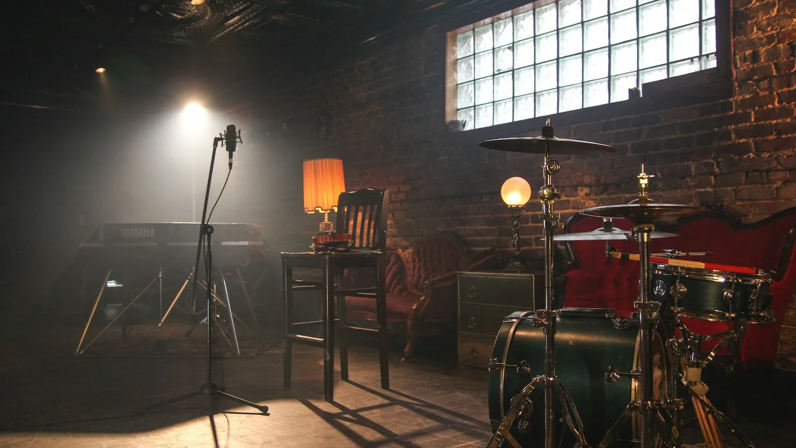 Student musicians performing under warm stage lighting